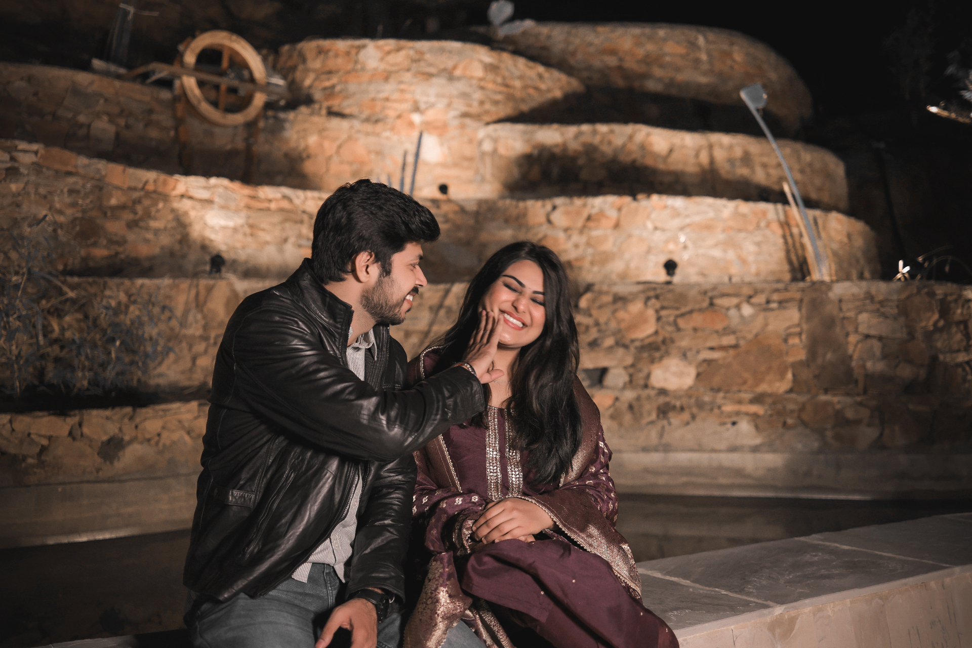 Couple sharing a playful moment during their pre-wedding shoot